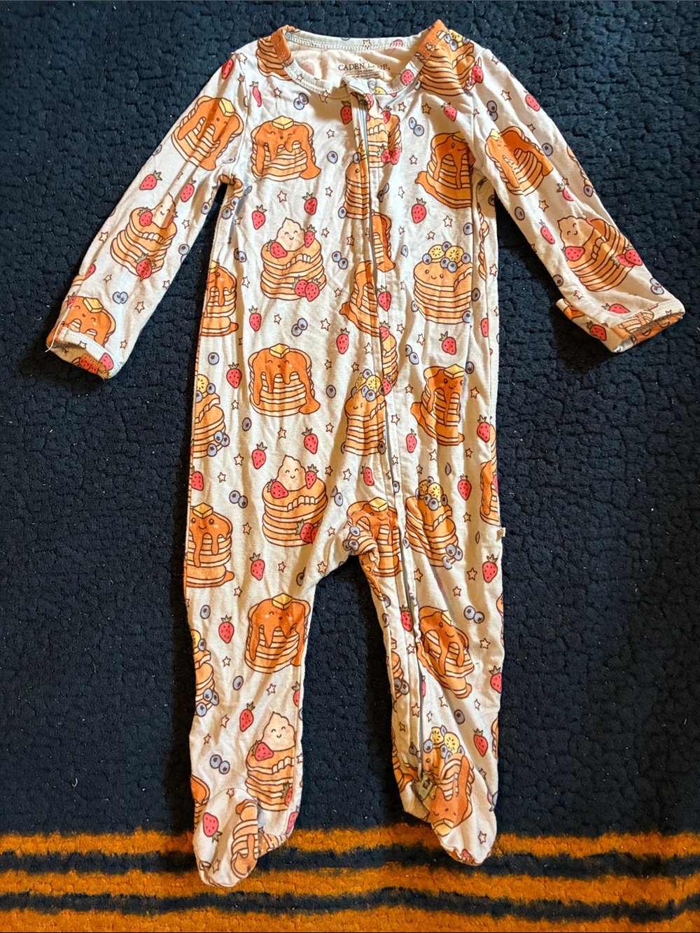 Caden Lane blue One-Piece Footie with Orange Pancake Print